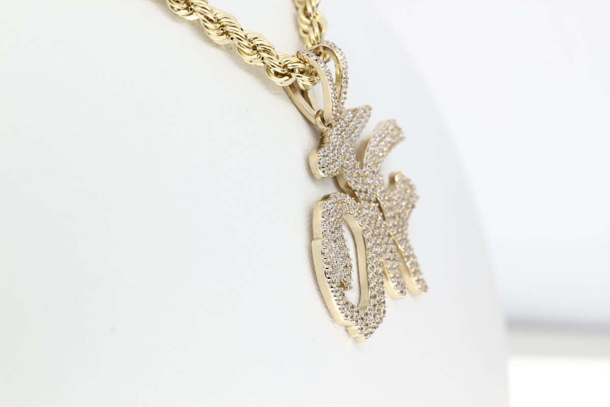 Geelgouden hanger OTF gezet met kristallen